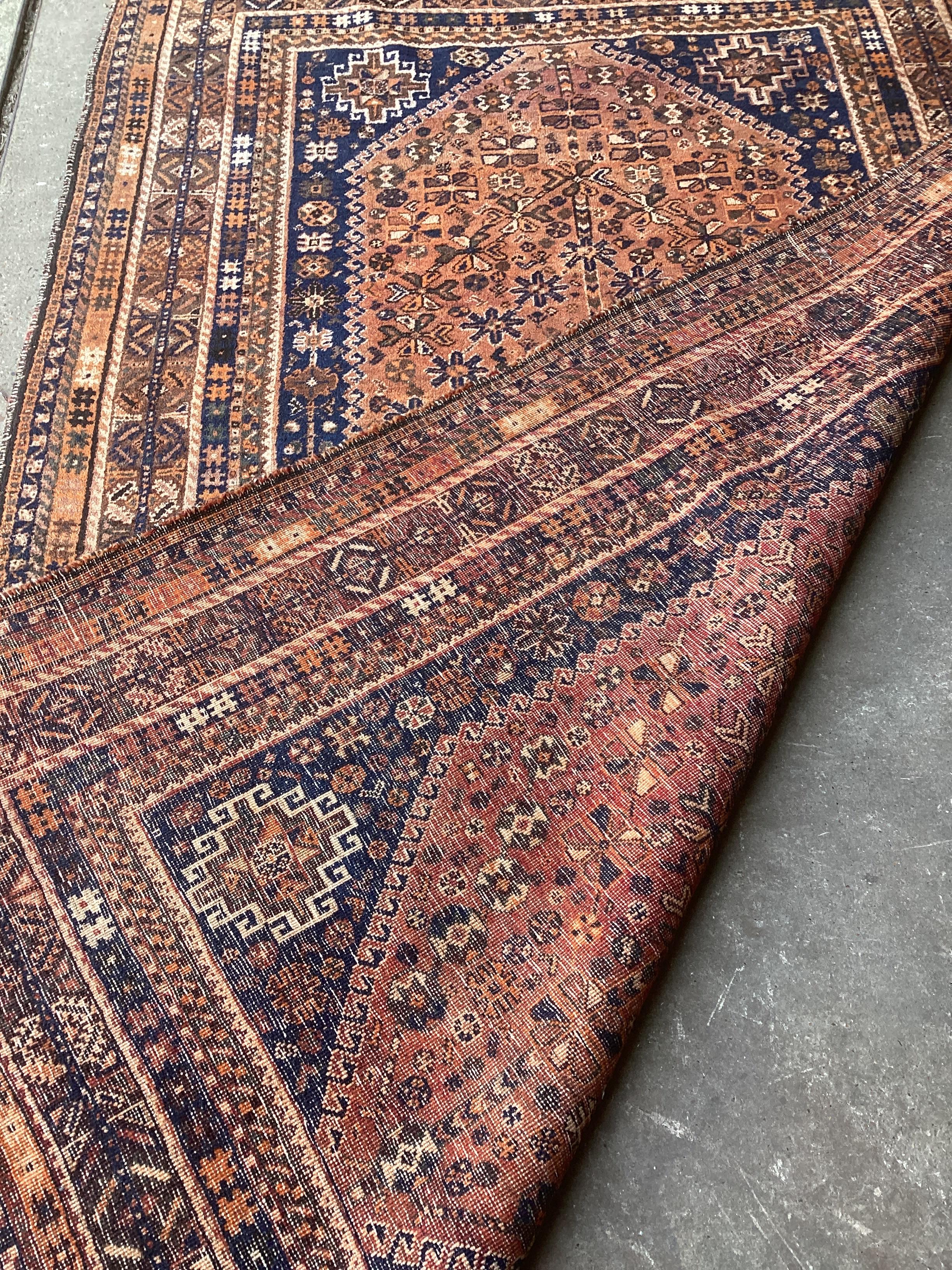 A Hamadan faded red ground rug, 260 x 160cm